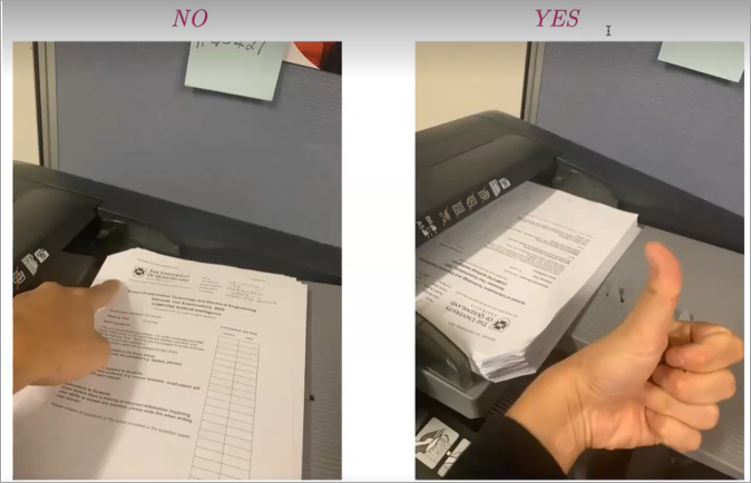 Papers on scanner labelled as No (wrong) Yes (right)
